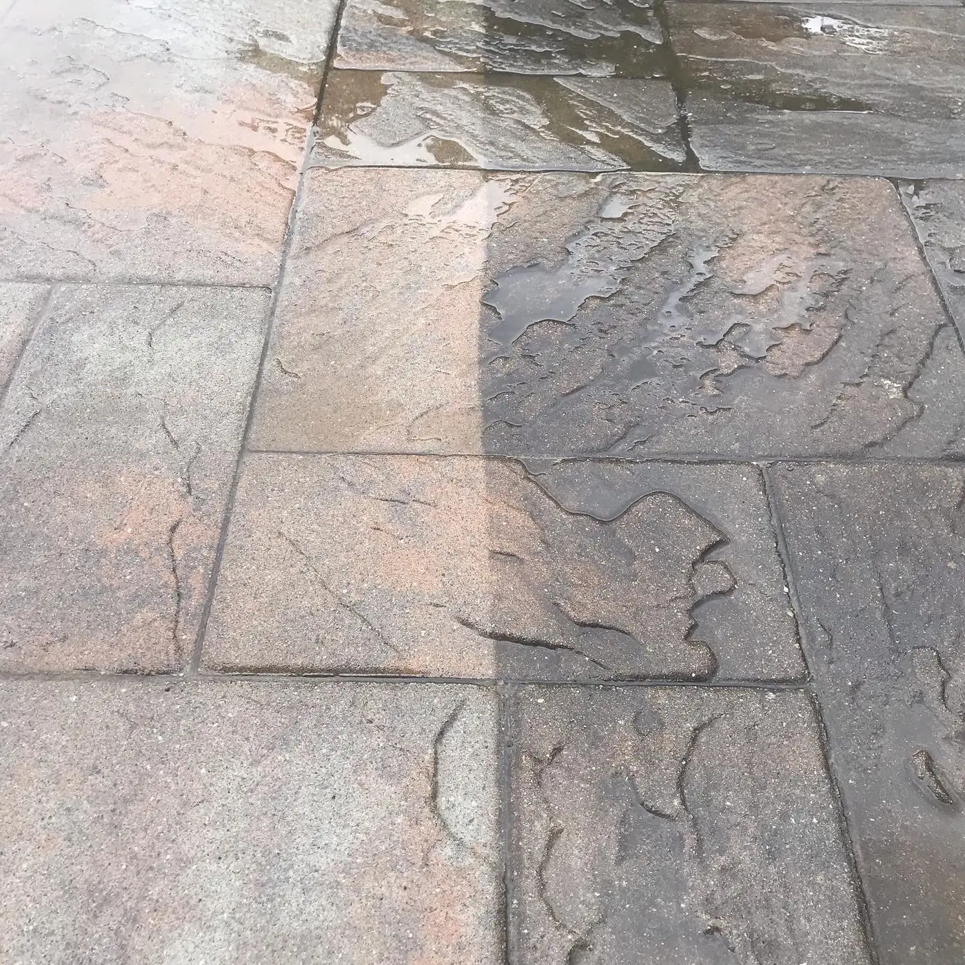 Paver surface half cleaned showing contrast