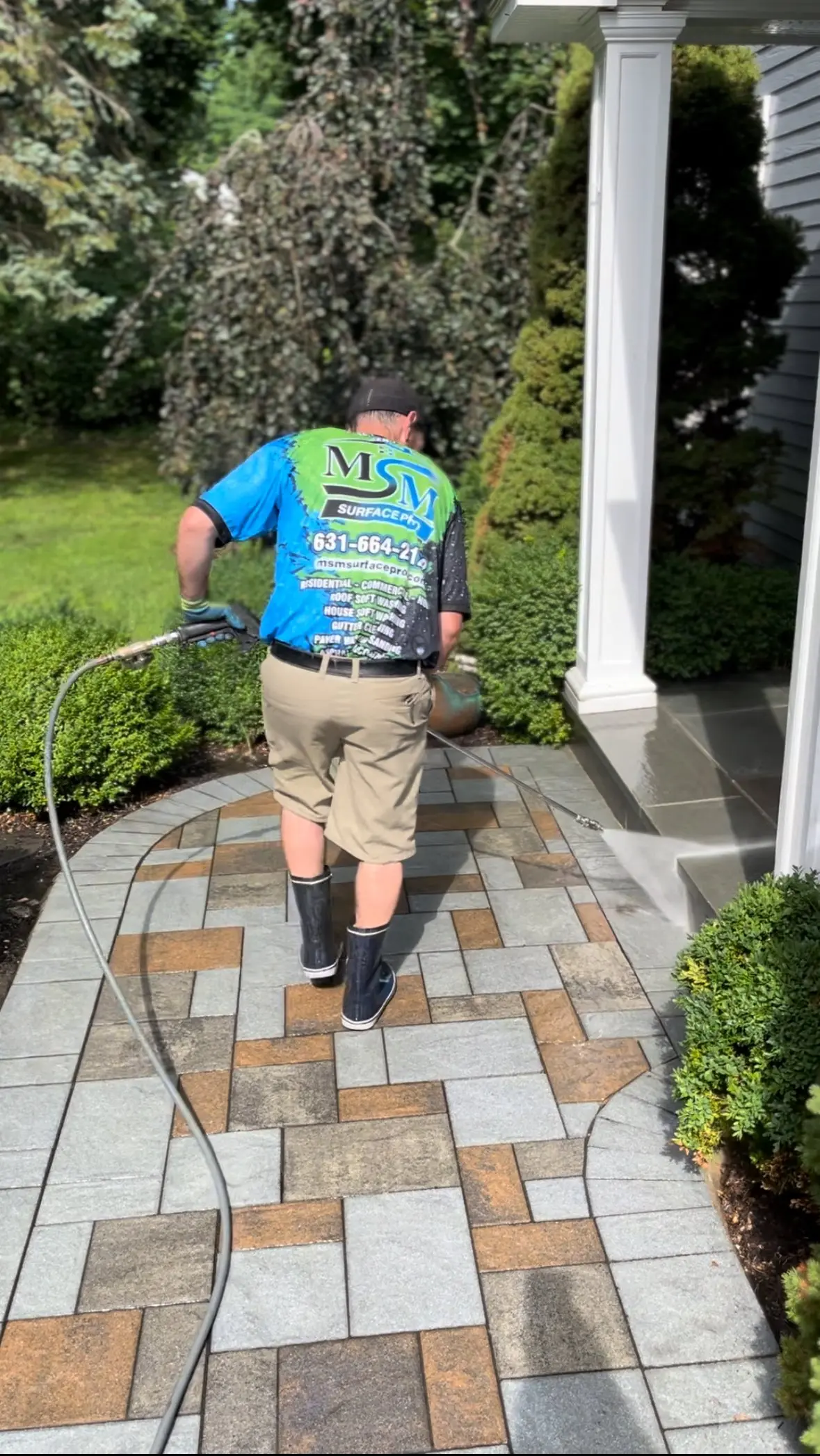 Heated pressure washing lifting years of grime from pavers