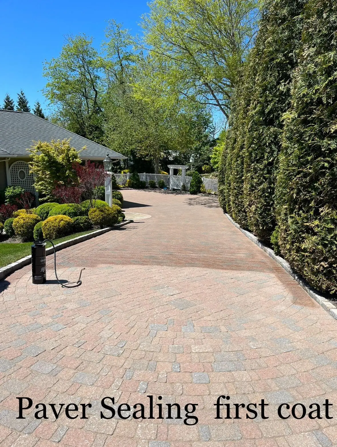 Sealer being applied to restored pavers