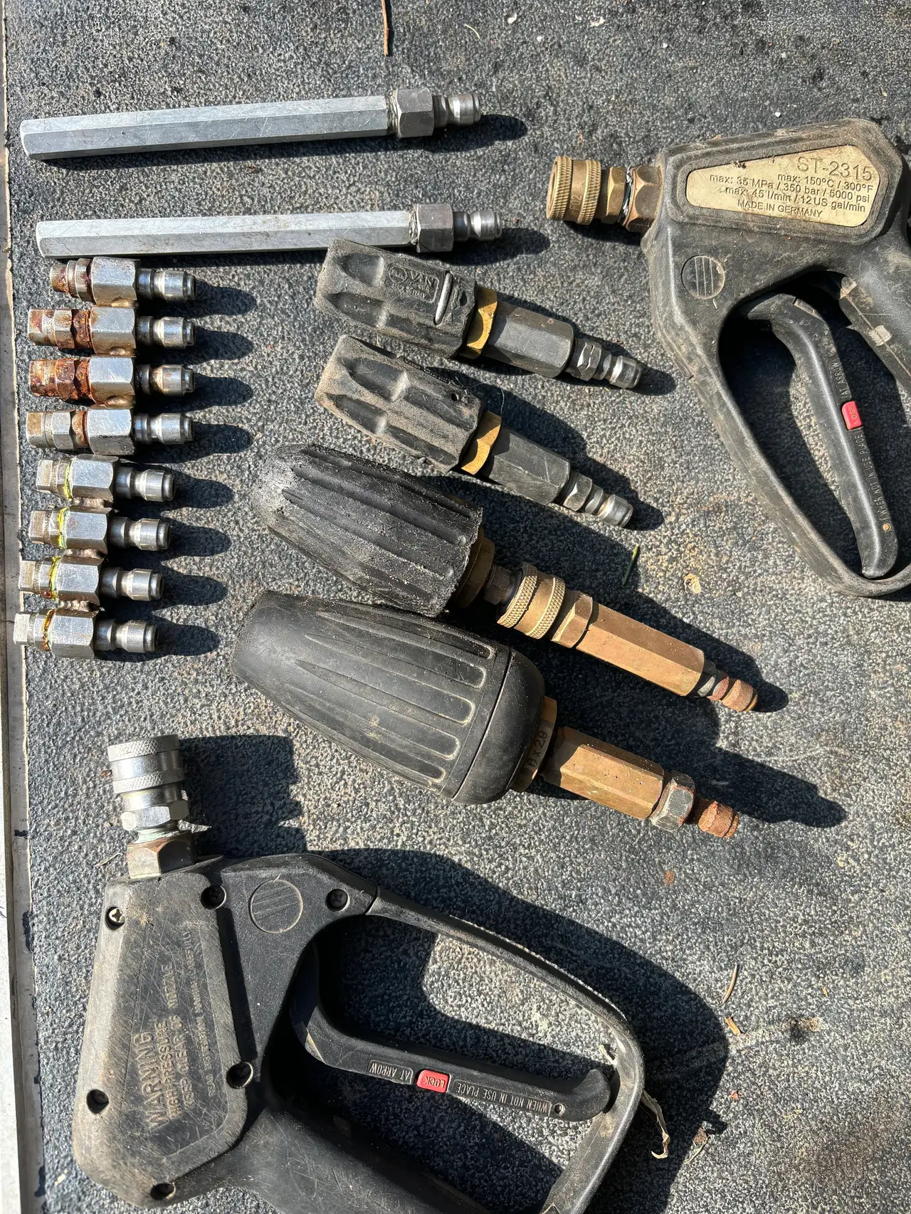 Professional pressure washing nozzles laid out