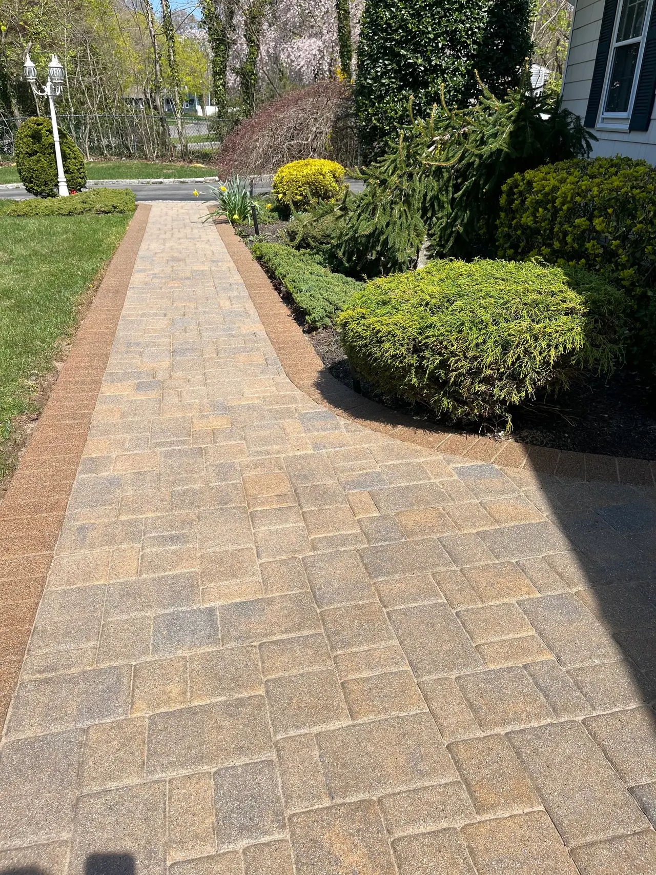 Sealed pavers with enhanced color and finish